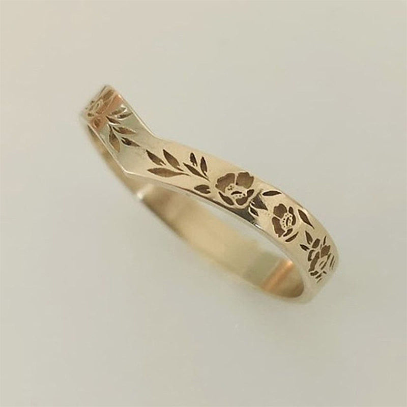 Elegant og enkel ring med kransdesign