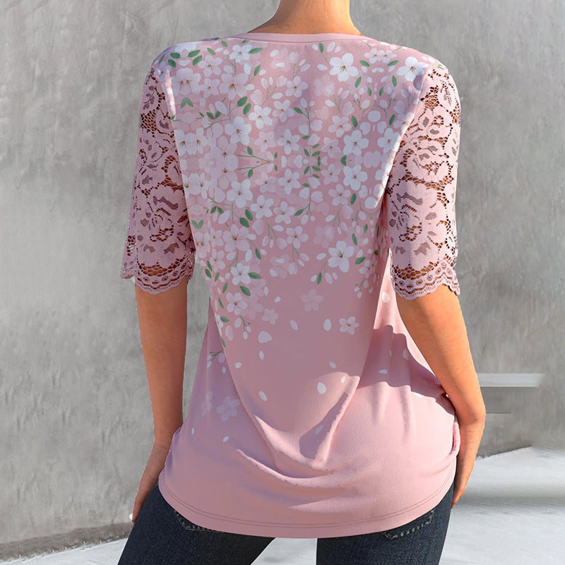 Blomstret bluse med blondeermer