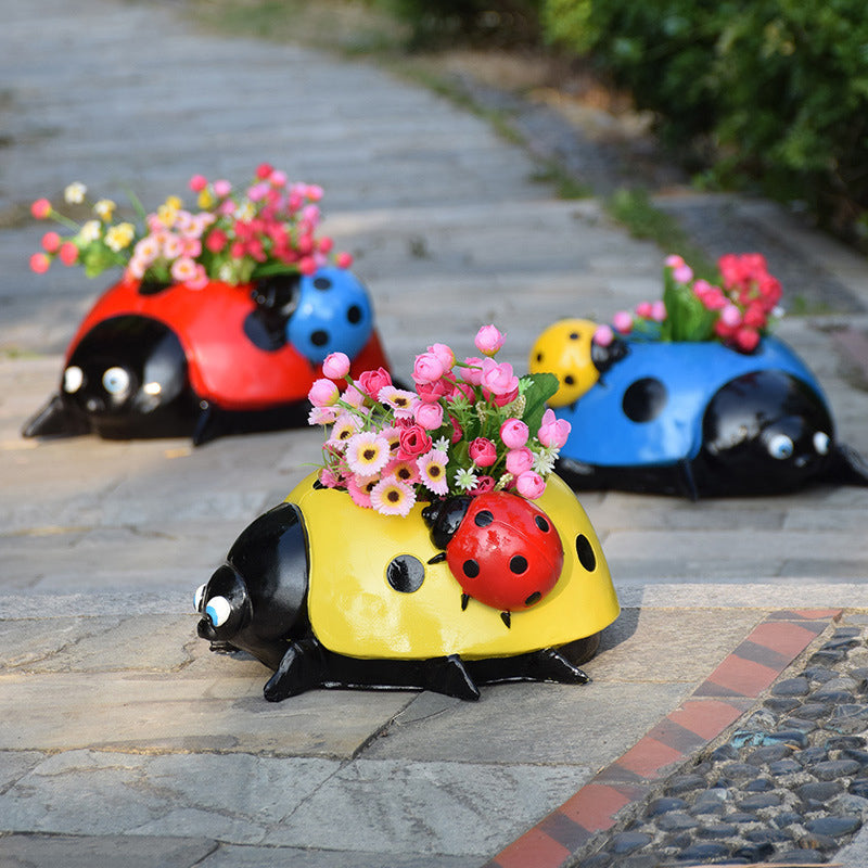 Marihøne blomsterpotte i metall