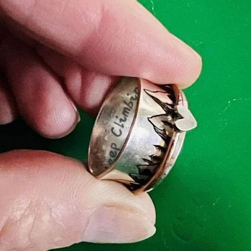 Ring med fortsett å klatre design