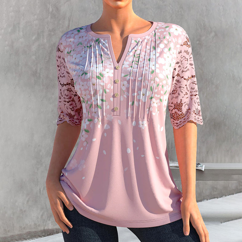 Blomstret bluse med blondeermer